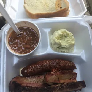 My $9.50 brisket/sausage special with two sides and a soda.
