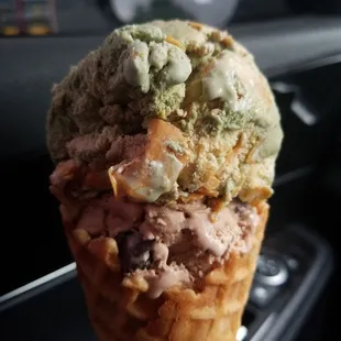 Waffle cone with a scoop of "camo" on top (something delicious involving peanut butter) and brownie batter in the bottom