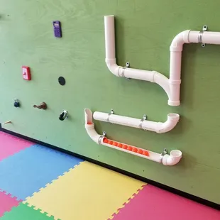 Play room! Love the calculator on the wall!