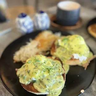 Carnitas Benedict, cilantro hollandaise, verdolagas (purslane garnish), super fresh pork carnitas with side of buttery hash browns.