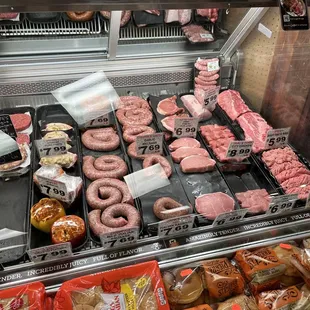 a display of meat and sausages