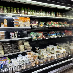 a display of cheeses and other foods