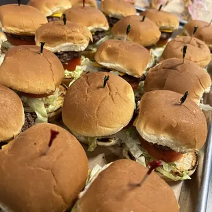 a tray of hamburgers on a table