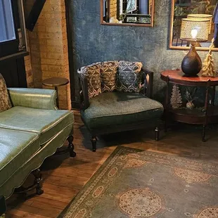 a living room with two couches and a table