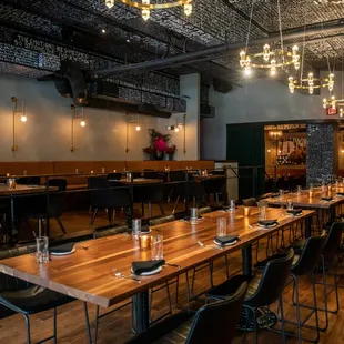 a dining room with tables and chairs