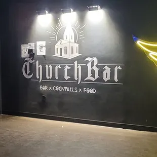 a neon sign in a dark room