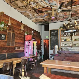 wooden tables and benches in a restaurant