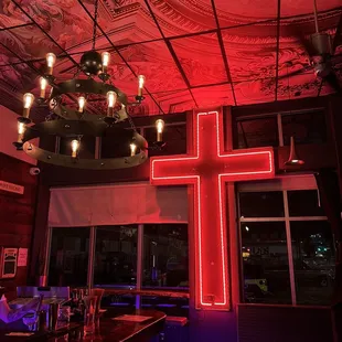 a large red cross on the ceiling