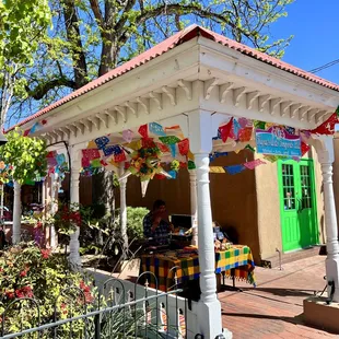 a colorful gazebo in a small town