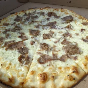 White pizza with sausage