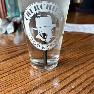 a glass with a straw