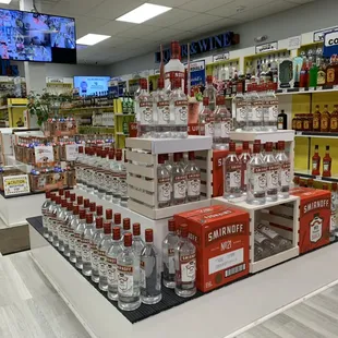 a display of bottles and glasses