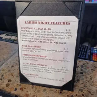 a menu for ladies's night features