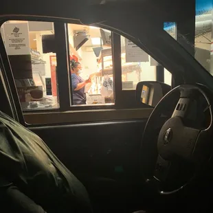 a man sitting in a car