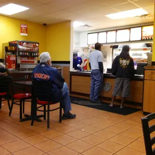 a group of people in a restaurant