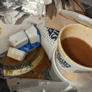 a cup of coffee and a spoon