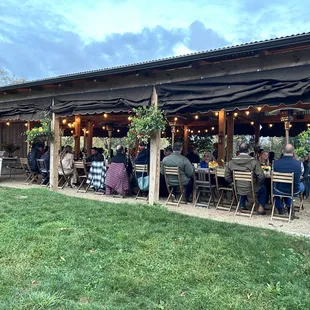 Covered dining area that seats 60. Chairs are very close together.