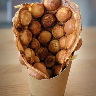 I couldn't decide which flavor I wanted, so the owner, Charlie, made it half pork floss seaweed (savory) and half egg tart (sweet) for me.