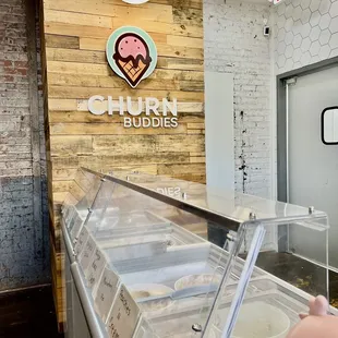 an ice cream shop with a piggy bank