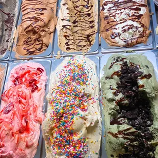 a variety of ice creams in trays