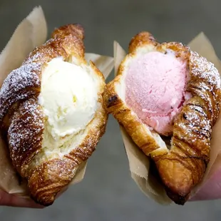 a hand holding a pastry