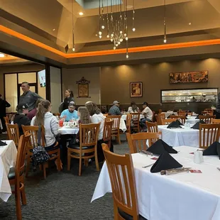 a large dining room filled with people