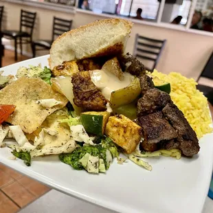 Beef and chicken kabob plate.