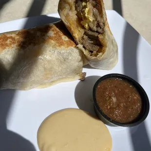 a burrito and sauce