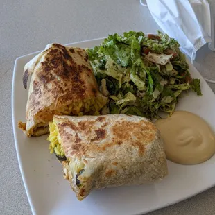 Chicken wrap plate with salad.