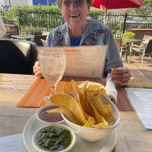 Plantain chips served with pesto