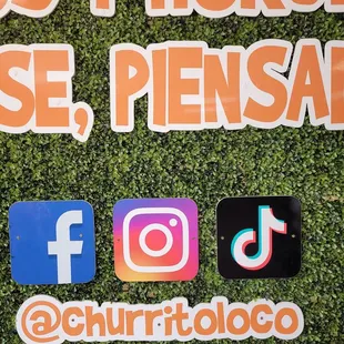 a close up of a sign for a social event