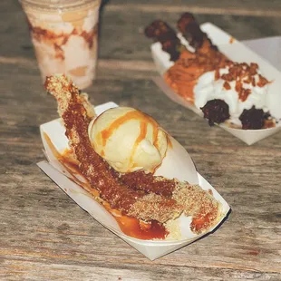 a hot dog with ice cream and caramel sauce