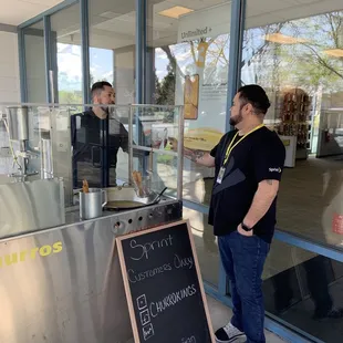 a man standing in front of a counter