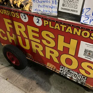a cart of fresh burritos