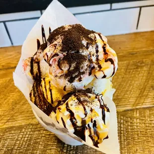three scoops of ice cream and chocolate