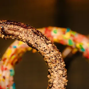 a close up of a chocolate covered donut