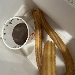 Churros actually comes with 4 and chocolate sauce