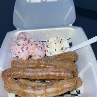 Churros with strawberry ice cream and Lechera Drizzle