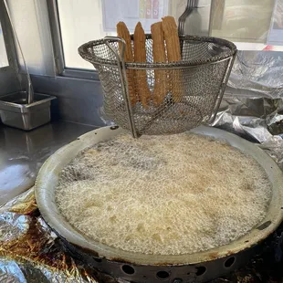 Vat where they make them in boiling oil.
