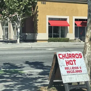 Look for this sign near the Bank of America.