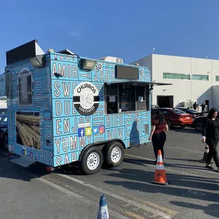 a food truck in a parking lot