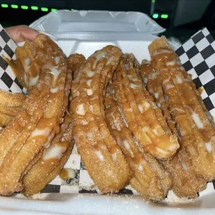 Churros with cajeta and lechera