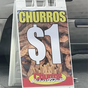 a sign for churros