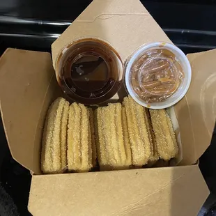 The box 15 mini and one free sauce. Extra sauce $1.00 more each.