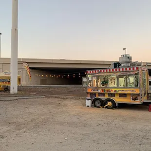 an ice cream truck parked in a parking lot