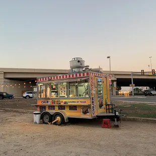 a food truck parked on the side of the road