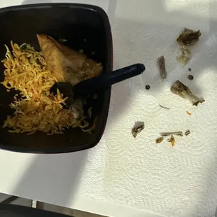Chicken biryani. It is full of bones that were randomly broken off throughout the rice and in the chicken.
