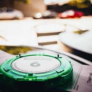 a close up of a table with a clock on it