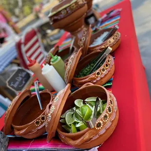 a row of chuy tacos on a table