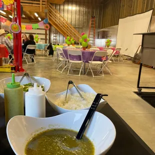 a bowl of soup and a bowl of rice